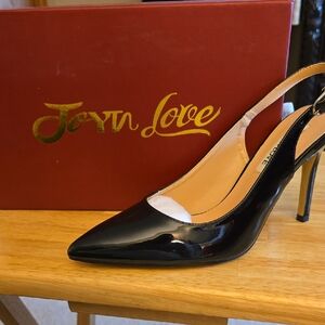 Elegant Black Patent Leather Slingback Heels by Joan Love